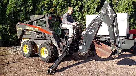 skid steer backhoe on youtube|skid steer backhoe attachment craigslist.